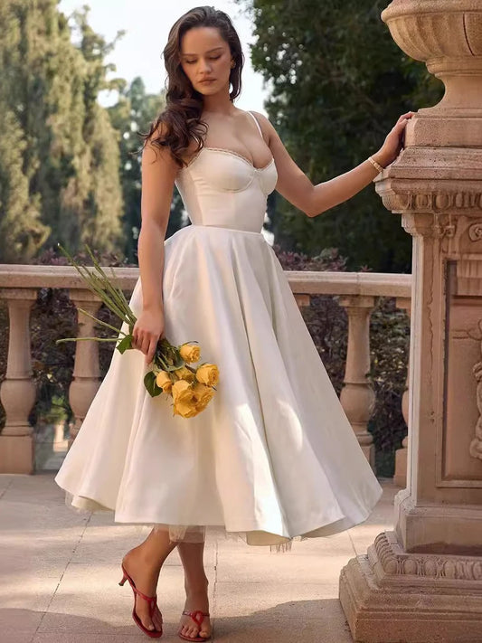 Suninheart Summer Spaghetti Strap Midi Dress with Elegant Fit and Flare Design